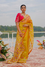 Load image into Gallery viewer, Yellow Pure Organza Highlighting Pearl Zardosi And Resham Work Designer Saree
