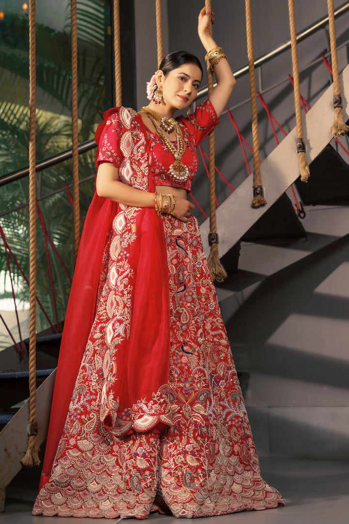 Red Color Captivating Heavy Embossed Embroidery Bridal Lehenga Choli