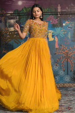 Load image into Gallery viewer, Lavishing Yellow Chinon Fabric Readymade Gown With Mirror Work On Sleeves
