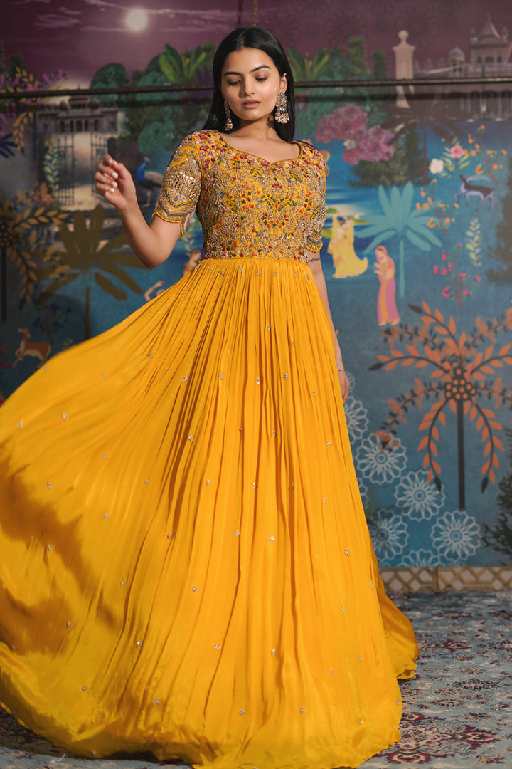 Lavishing Yellow Chinon Fabric Readymade Gown With Mirror Work On Sleeves