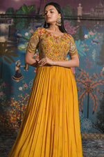 Load image into Gallery viewer, Lavishing Yellow Chinon Fabric Readymade Gown With Mirror Work On Sleeves
