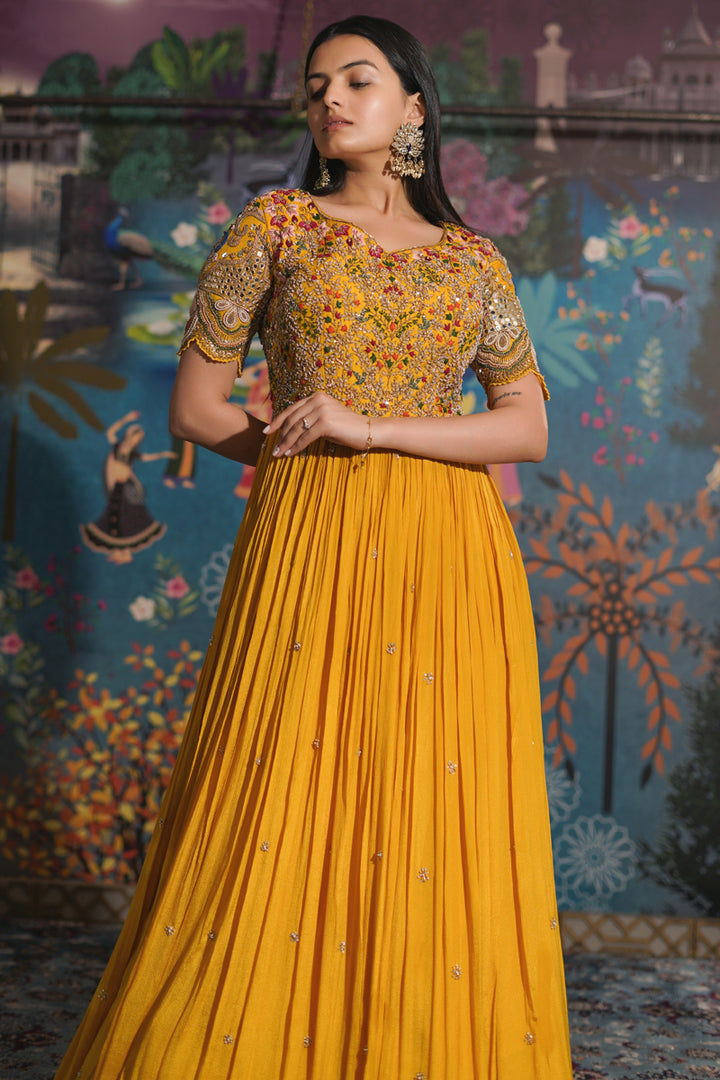 Lavishing Yellow Chinon Fabric Readymade Gown With Mirror Work On Sleeves